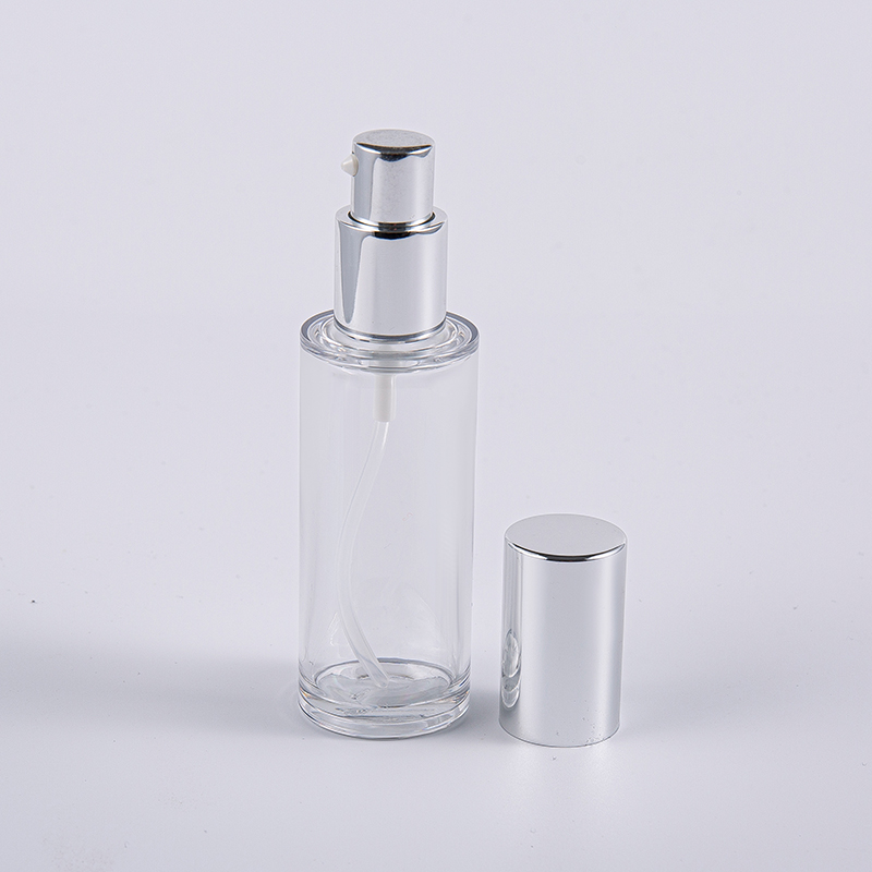 Botella de loción redonda de alta calidad de 35 ml con uso de viaje con bomba de aluminio Botella de loción redonda de alta calidad de 35 ml con uso de viaje con bomba de aluminio