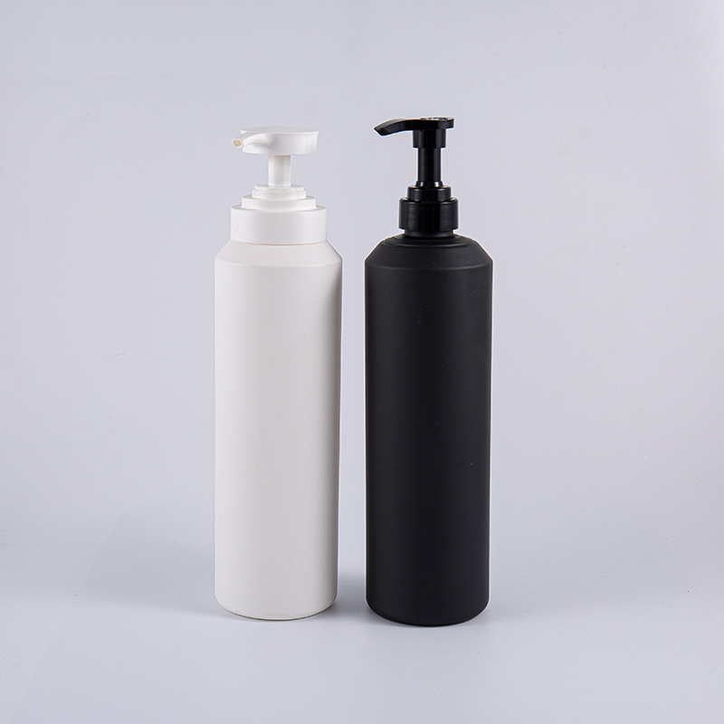 Botella de limpieza de gran tamaño redonda blanca y negra de la bomba de 1000ml PE de la suavidad al tacto